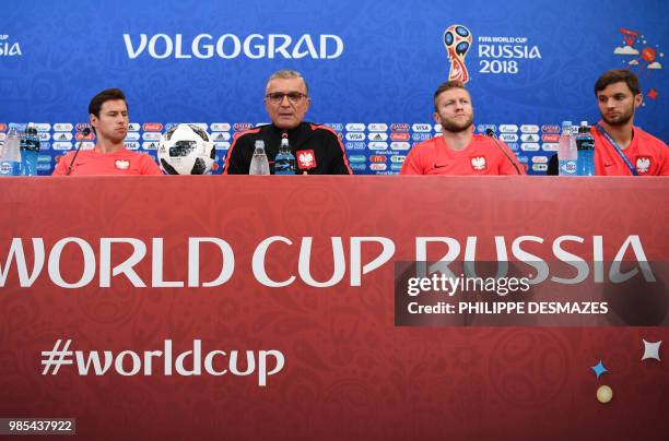 Poland's coach Polish Adam Nawalka and players Bartosz Bereszynski , Jakub Blaszczykowski and Grzegorz Krychowiak attend a press conference at the...