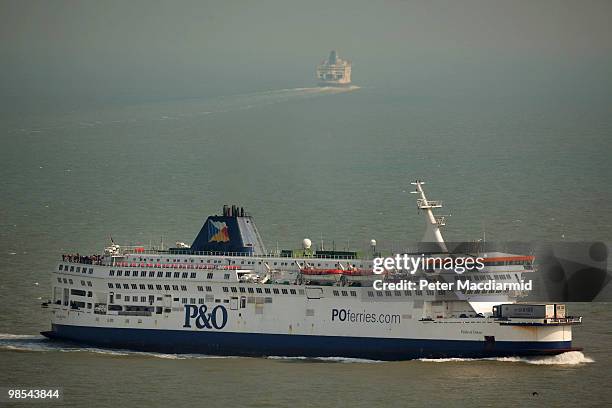 Ferry comes into Dover as another heads back to Calais, France on April 19, 2010 in Dover, England. Thousands of UK passengers are unable to return...