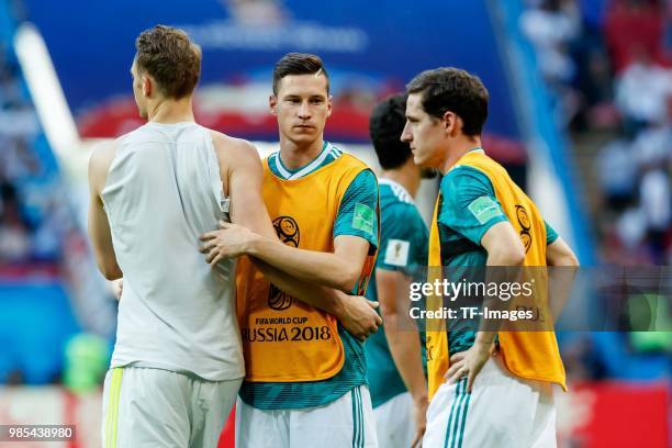 Goalkeeper Manuel Neuer of Germany, Julian Draxler of Germany and Sebastian Rudy of Germany look dejected after the 2018 FIFA World Cup Russia group...