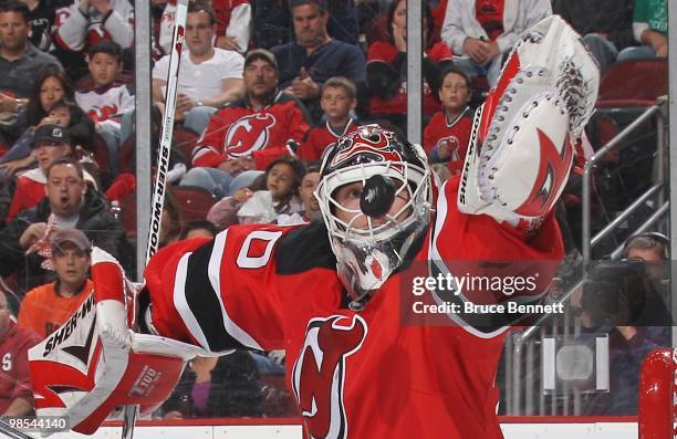 Martin Brodeur of the New Jersey Devils makes the save against the Philadelphia Flyers in Game Two of the Eastern Conference Quarterfinals during the...