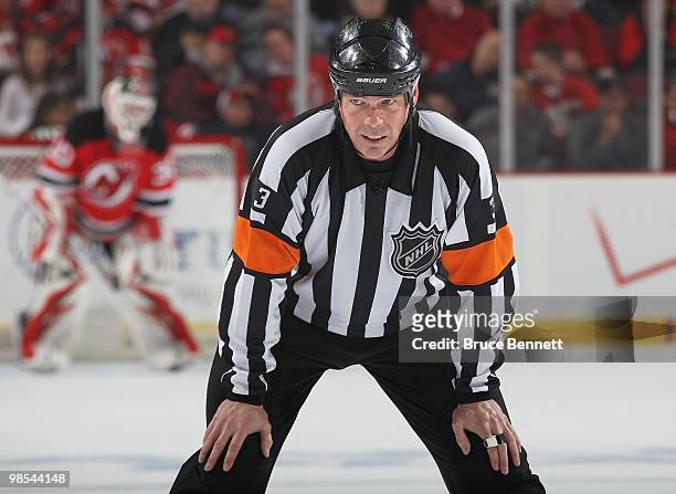 Referee Mike Leggo officiates the game between the Philadelphia Flyers and the New Jersey Devils in Game Two of the Eastern Conference Quarterfinals...