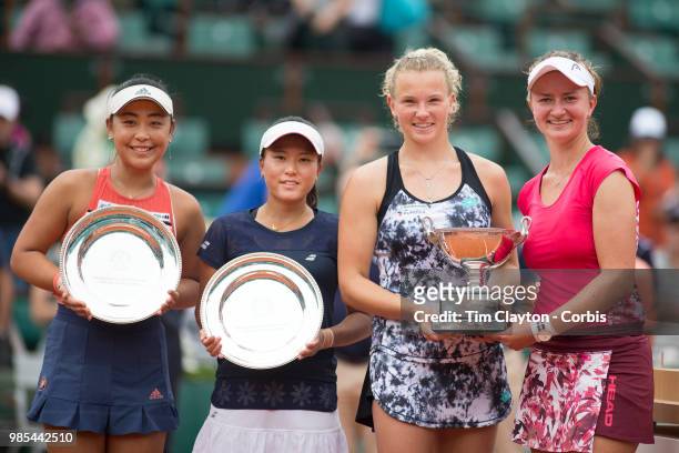 June 10. French Open Tennis Tournament - Day Fifteen. Barbora Krejcikova, and Katerina Siniakova of the Czech Republic with the winners trophy after...