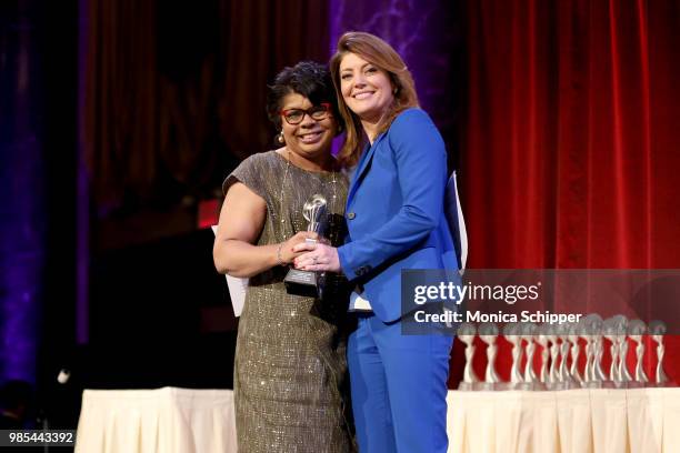 April Ryan and Norah O'Donnell pose onstage at The Gracies, presented by the Alliance for Women in Media Foundation at Cipriani 42nd Street on June...