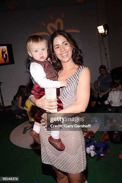 Actress Ana Ortiz, holding daughter Paloma, attends the Pampers Dry Max launch party at Helen Mills Theater on March 18, 2010 in New York City.