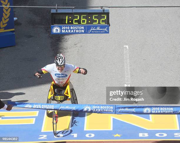 Ernst Van Dyk crosses the finish line to win the mens wheelchair division of the 114th Boston Marathon on April 19, 2010 in Boston, Massachusetts.