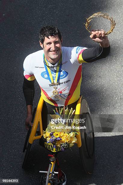 Ernst Van Dyk celebrates winning the mens wheelchair division of the 114th Boston Marathon on April 19, 2010 in Boston, Massachusetts.