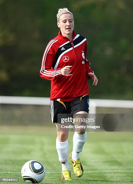 Anja Mittag runs with the ball during a training session at the Philippe Mueller stadium on April 19, 2010 in Dresden, Germany.