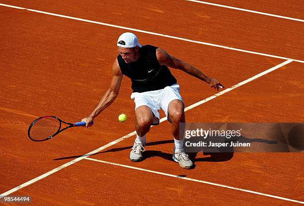 Lukasz Kubot of Poland returns a forehand to Marcel Granollers of Spain on day one of the ATP 500 World Tour Barcelona Open Banco Sabadell 2010...