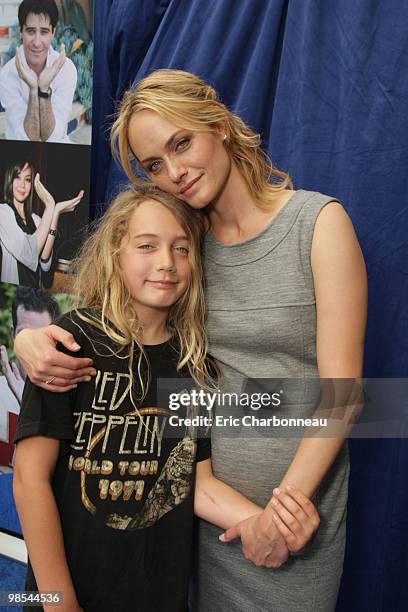 Amber Valletta and son Auden McCaw at Disneynature's premiere of 'Oceans' on April 17, 2010 at the El Capitan Theatre in Hollywood, California.