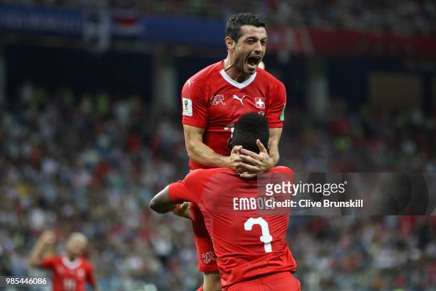Blerim Dzemaili of Switzerland celebrates with teammate Breel Embolo after scoring his team's first goal during the 2018 FIFA World Cup Russia group...