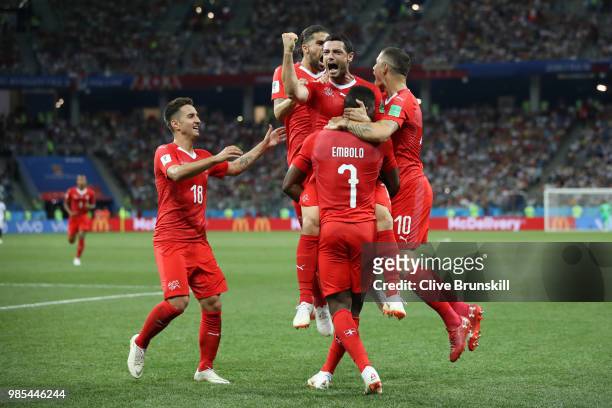 Blerim Dzemaili of Switzerland celebrates with teammates after scoring his team's first goal during the 2018 FIFA World Cup Russia group E match...