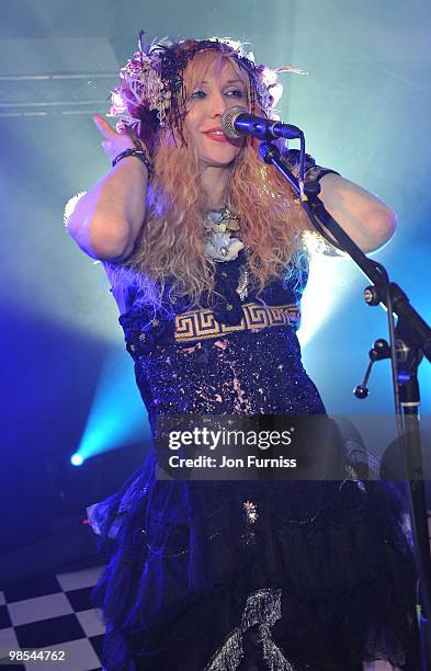 Courtney Love performs during Alice in Wonderland themed launch of 'Alice by Temperley' collection during London Fashion Week Autumn/Winter 2010 at...