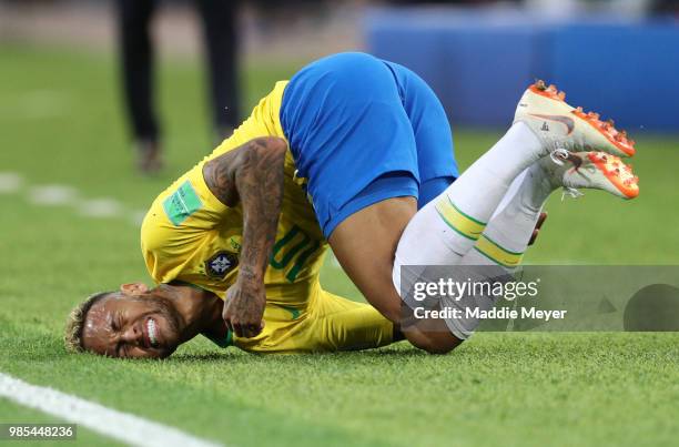 Neymar Jr of Brazil falls down after being fouled during the 2018 FIFA World Cup Russia group E match between Serbia and Brazil at Spartak Stadium on...