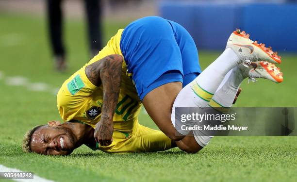 Neymar Jr of Brazil falls down after being fouled during the 2018 FIFA World Cup Russia group E match between Serbia and Brazil at Spartak Stadium on...