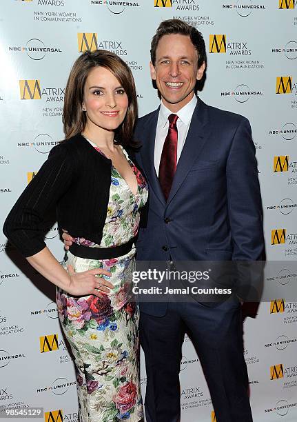 Comedians Tina Fey and Seth Meyers pose for photos at the 2010 Matrix Awards presented by New York Women in Communications at The Waldorf Astoria on...