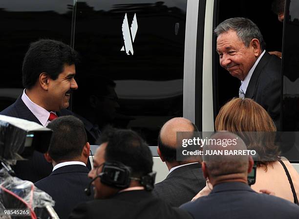 Cuban President Raul Castro is welcomed by Venezuela's Foreign Minister Nicolas Maduro on his arrival at Fort Tiuna, for a military parade to be held...