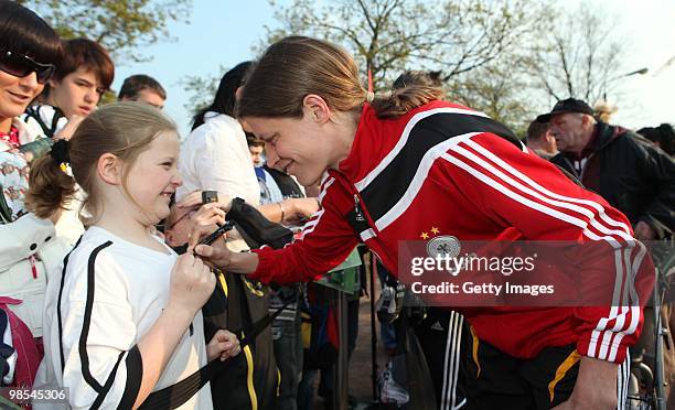 Kerstin Garefrekes signs autographes after a training session at the Philippe Mueller stadium on April 19, 2010 in Dresden, Germany.