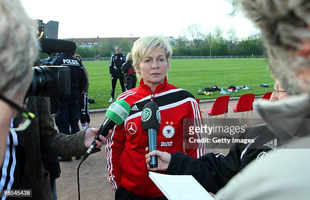 Head coach Silvia Neid gives interviews after a training session at the Philippe Mueller stadium on April 19, 2010 in Dresden, Germany.