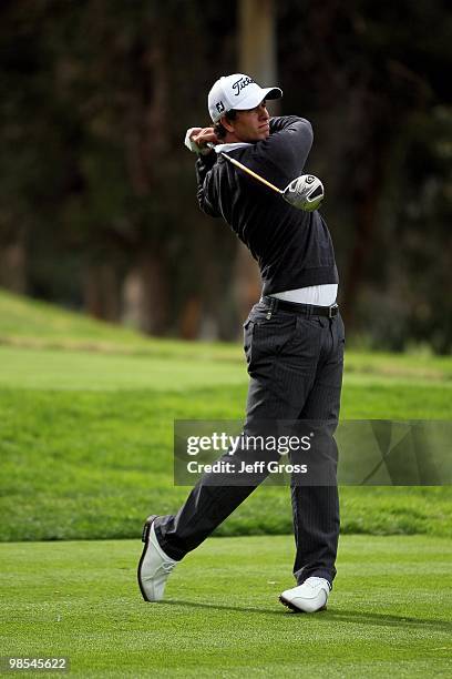 Adam Scott of Australia hits a shot during the first round of the Northern Trust Open at Riviera Country Club on February 4, 2010 in Pacific...