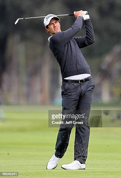 Adam Scott of Australia hits a shot during the first round of the Northern Trust Open at Riviera Country Club on February 4, 2010 in Pacific...