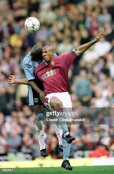 Paul Williams of Coventry challenges Dion Dublin of Villa during the FA Carling Premier League game between Aston Villa v Coventry City at Villa...