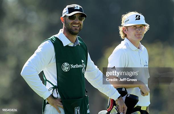 Brandt Snedeker looks on with his caddie during the final round of the Northern Trust Open at Riviera Country Club on February 7, 2010 in Pacific...