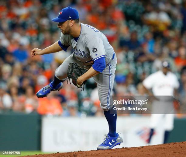 Marco Estrada of the Toronto Blue Jays pitches in the first inning against the Houston Astros at Minute Maid Park on June 27, 2018 in Houston, Texas.