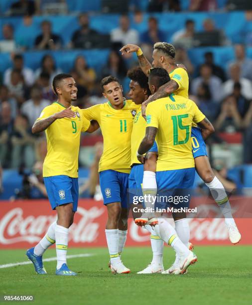Paulinho of Brazil celebrates with team mates after he scores the opening goal during the 2018 FIFA World Cup Russia group E match between Serbia and...