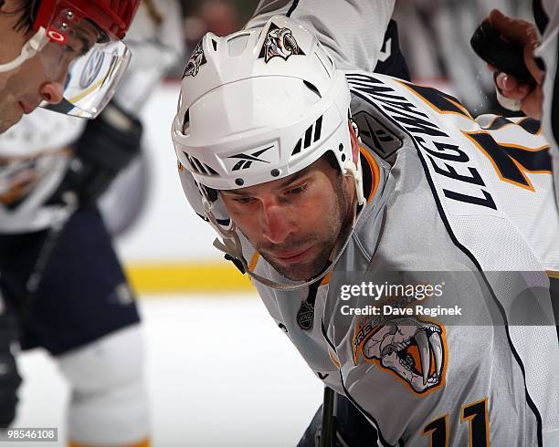 David Legwand of the Nashville Predators gets set for the face-off during an NHL game against the Detroit Red Wings at Joe Louis Arena on April 3,...