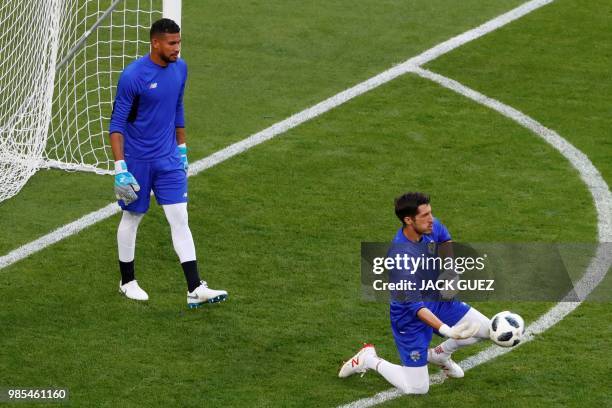 Panama's goalkeeper Jaime Penedo kneels to passes a ball past Panama's goalkeeper Jose Calderon during a training session at the Mordovia Arena in...