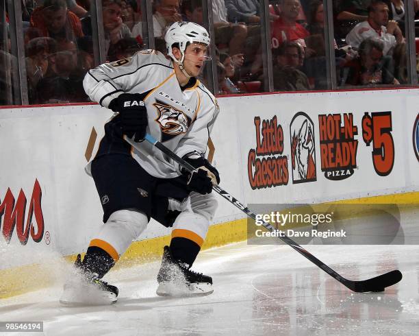 Marcel Goc of the Nashville Predators stops behind the net with the puck during an NHL game against the Detroit Red Wings at Joe Louis Arena on April...