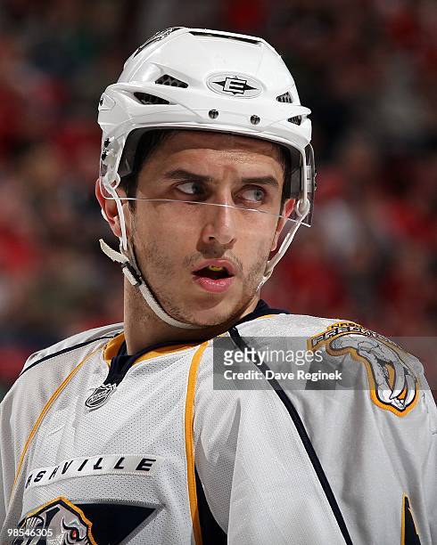 Marcel Goc of the Nashville Predators looks over his shoulder during an NHL game against the Detroit Red Wings at Joe Louis Arena on April 3, 2010 in...