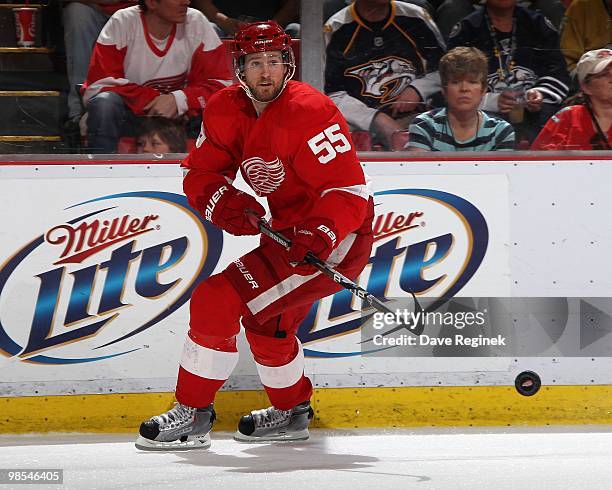 Niklas Kronwall of the Detroit Red Wings makes a back hand pass during an NHL game against the Nashville Predators at Joe Louis Arena on April 3,...