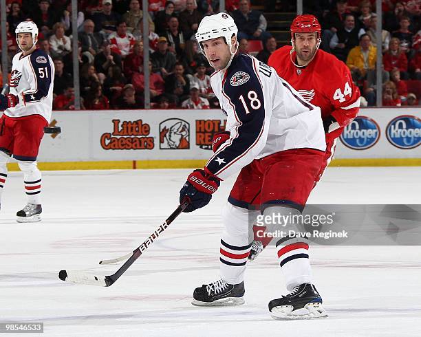 Umberger of the Columbus Blue Jackets back-hands the puck into the offensive end of the ice during an NHL game against the Detroit Red Wings at Joe...