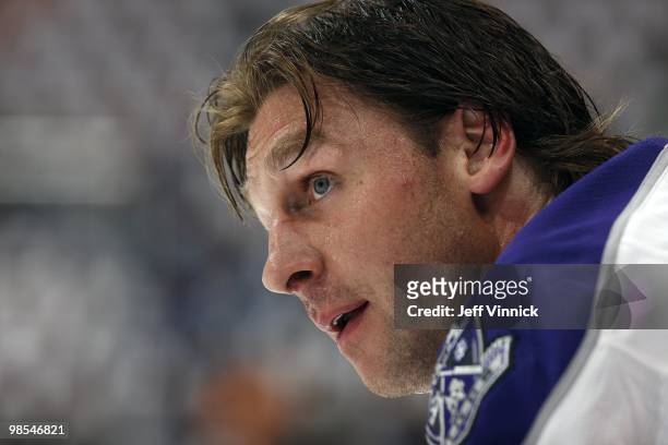 Ryan Smyth of the Los Angeles Kings looks on from the bench in Game One of the Western Conference Quarterfinals against the Vancouver Canucks during...