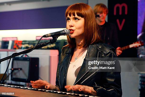 Kate Nash performs at a meet and greet signing session with fans at HMV, Oxford Street on April 19, 2010 in London, England.