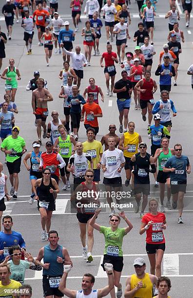Participants run down Boylston Street toward the finish line during the 114th Boston Marathon on April 19, 2010 in Boston, Massachusetts.