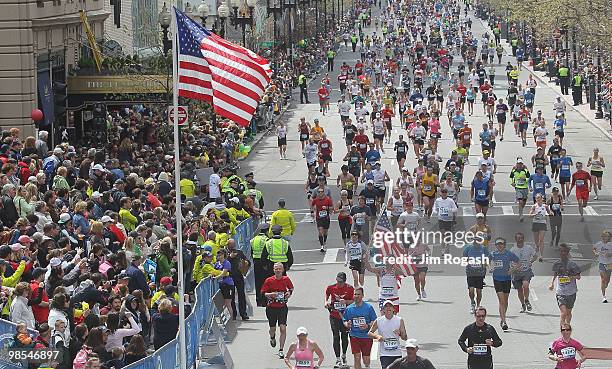 Participants run down Boylston Street toward the finish line during the 114th Boston Marathon on April 19, 2010 in Boston, Massachusetts.