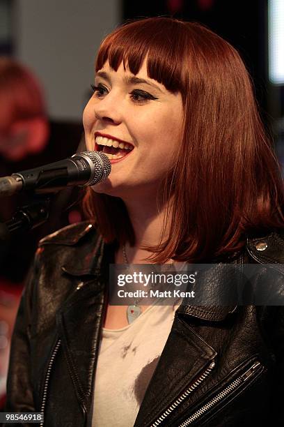 Kate Nash performs at a meet and greet signing session with fans at HMV, Oxford Street on April 19, 2010 in London, England.