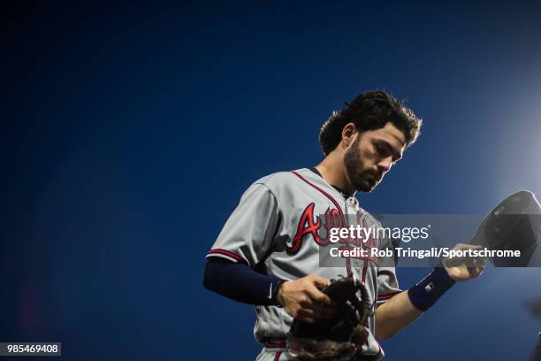 Dansby Swanson of the Atlanta Braves looks on during the game against the Philadelphia Phillies at Citizens Bank Park on Wednesday, May 23, 2018 in...