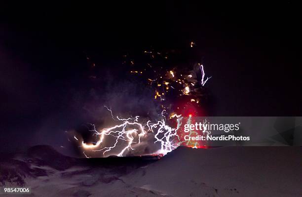 Lightning is seen within a cloud of volcanic matter as it rises from the erupting Eyjafjallajokull volcano April 18, 2010 Eyjafjallajokull, Iceland....