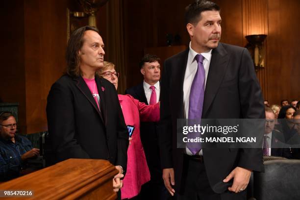 Mobile CEO John Legere and Sprint Executive Chairman Marcelo Claure arrive to testify at the Senate Judiciary Committee's Subcommittee on Antitrust,...