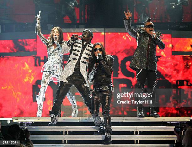 Fergie, will.i.am, Taboo and apl.de.ap of Black Eyed Peas perform at Philips Arena on February 4, 2010 in Atlanta, Georgia.