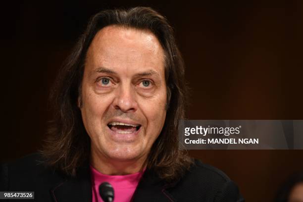 Mobile CEO John Legere gives testimony at the Senate Judiciary Committee's Subcommittee on Antitrust, Competition Policy and Consumer Rights hearing...