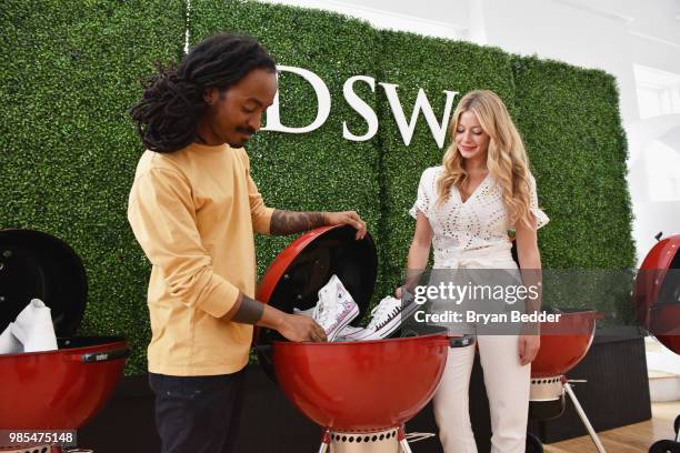 Chris Pyrate and Jordana Schrager customize DSW shoes at DSW Block Party hosted by Olympians Adam Rippon and Mirai Nagasu on June 27, 2018 at...