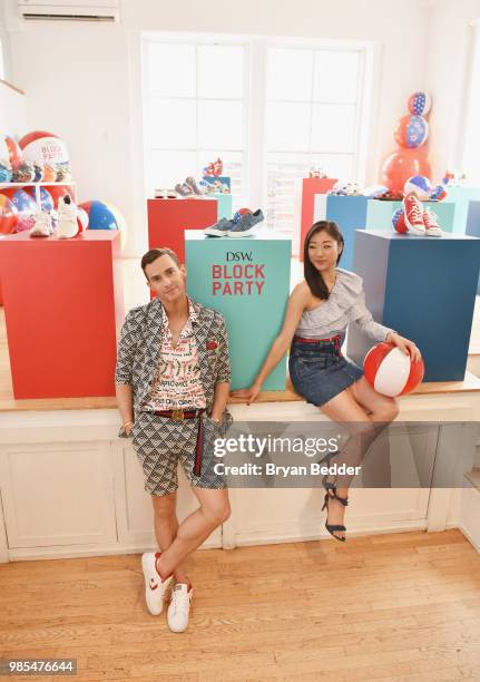 Adam Rippon and Mirai Nagasu attend DSW Block Party hosted by Olympians Adam Rippon and Mirai Nagasu on June 27, 2018 at Ramscale Studio in New York...