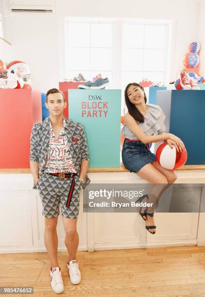 Adam Rippon and Mirai Nagasu attend DSW Block Party hosted by Olympians Adam Rippon and Mirai Nagasu on June 27, 2018 at Ramscale Studio in New York...