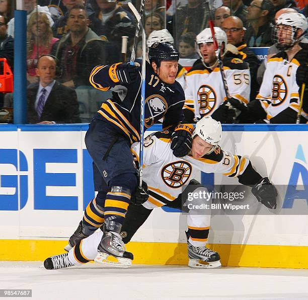 Raffi Torres of the Buffalo Sabres battles for position against Vladimir Sobotka of the Boston Bruins in Game Two of the Eastern Conference...
