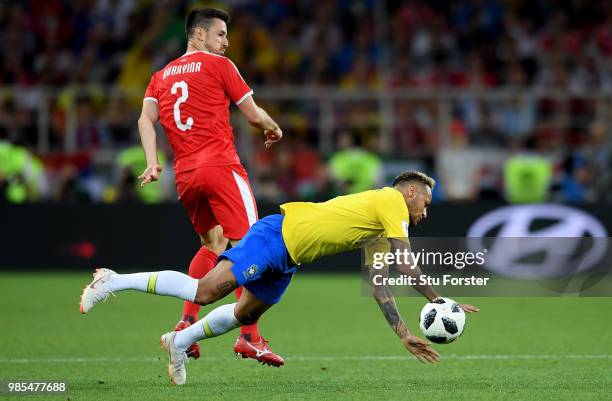 Neymar Jr of Brazil goes down under a challenge from Antonio Rukavina of Serbia during the 2018 FIFA World Cup Russia group E match between Serbia...