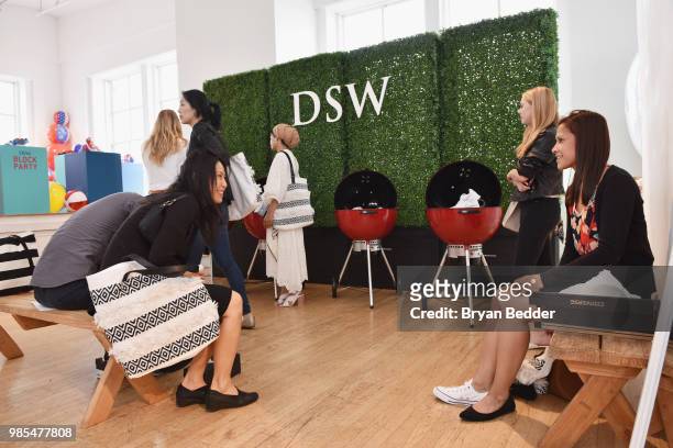 Guests attend DSW Block Party hosted by Olympians Adam Rippon and Mirai Nagasu on June 27, 2018 at Ramscale Studio in New York City.